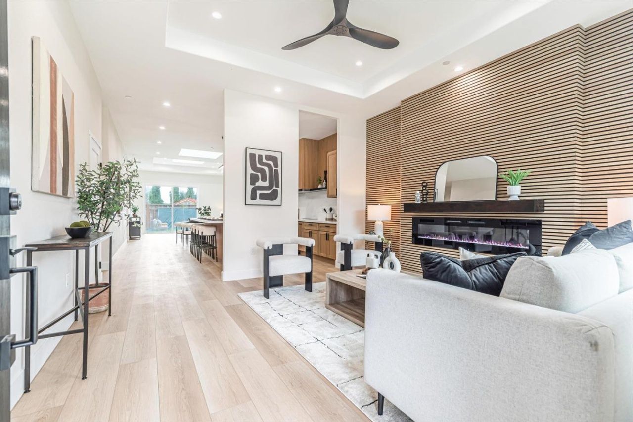 Open great room with oak slat feature wall
