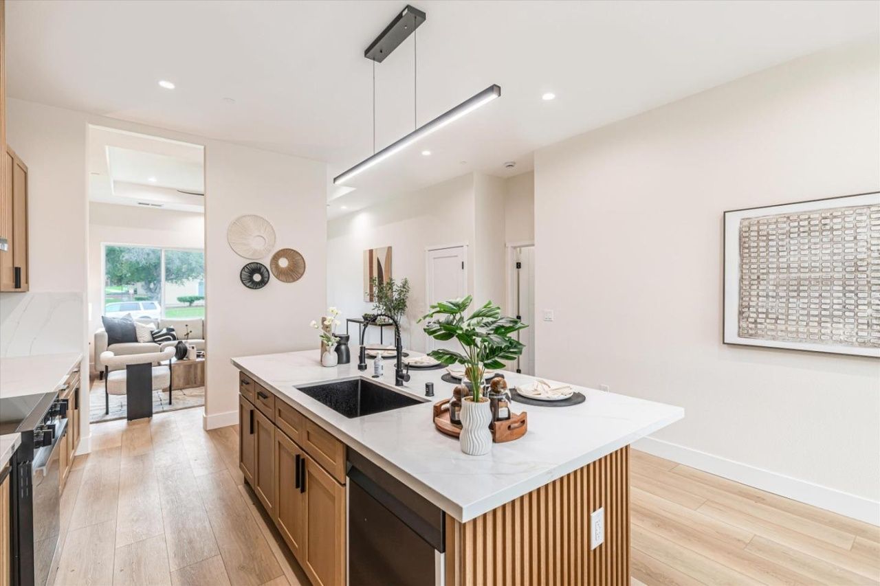 Kitchen island with linear pendant