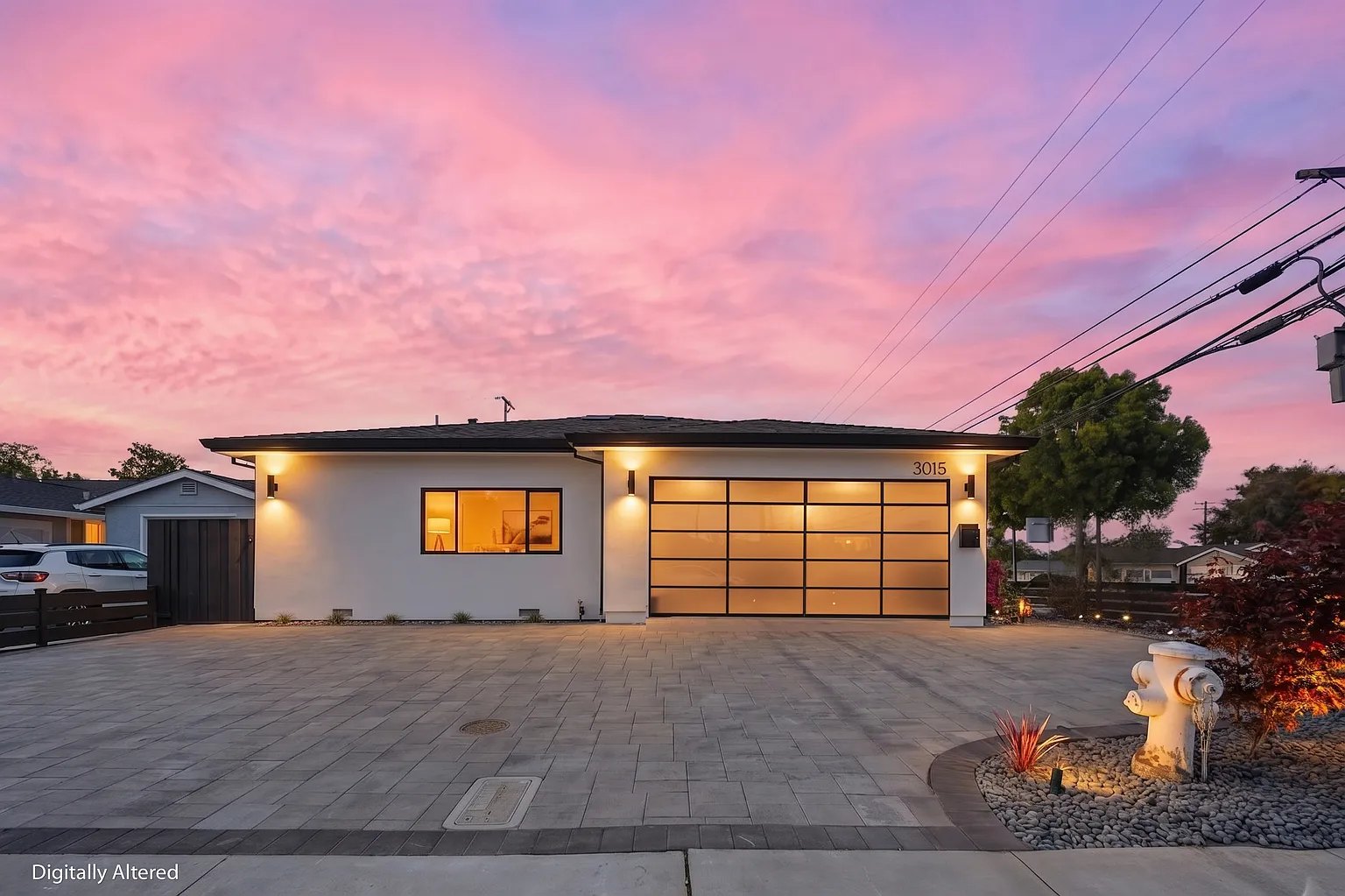 Machado remodel front elevation at dusk by CalX Homes